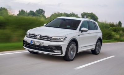 Volkswagen Tiguan - Νέοι Κινητήρες, Νέες Εκδόσεις, Νέες Τιμές» • Νέα γκάμα κινητήρων βενζίνης TSI και diesel TDI από 1.4l έως 240PS • Tiguan R-Line: SUV χαρακτήρας σε Sport μανδύα • Νέες τιμές με όφελος έως €4.750 Το νέο Tiguan αναβαθμίζεται με νέους κινητήρες βενζίνης TSI & diesel TDI και νέες sport-εκδόσεις, ενώ διατίθεται παράλληλα με όφελος έως €4.750. Αναλυτικότερα: Νέοι κινητήρες TSI & TDI Το Tiguan διαθέτει μία νέα, πλήρη γκάμα κινητήρων βενζίνης TSI και diesel TDI. Πιο συγκεκριμένα, ξεκινά άμεσα η διάθεση του Tiguan με τον κινητήρα βενζίνης 2.0 TSI 180PS 4Motion, καθώς και με τον κορυφαίο κινητήρα diesel 2.0 Bi-TDI 4Motion απόδοσης 240PS. Και οι 2 κινητήρες συνδυάζονται αποκλειστικά με κιβώτιο DSG7. Επίσης, για πρώτη φορά, το Tiguan εφοδιάζεται με τον κινητήρα βενζίνης 1.4 TSI 150PS 4Motion με κιβώτιο DSG6. Επιπρόσθετα, όλοι οι κινητήρες 2.0 TDI περιλαμβάνουν στον βασικό εξοπλισμό Ηλεκτρoνικά Ρυθμιζόμενες Αναρτήσεις DCC (Dynamic Chassis Control). Με τις προσθήκες των νέων κινητήρων, το Tiguan αποτελεί το SUV με την μεγαλύτερη γκάμα κινητήρων βενζίνης & diesel στην Ελληνική αγορά, προσφέροντας τις ακόλουθες 12 επιλογές: Κινητήρες Βενζίνης Κινητήρες Diesel 1.4 TSI 125PS 1.6 TDI 115PS 1.4 TSI 150PS ACT 2.0 TDI 150PS 1.4 TSI 150PS ACT DSG6 2.0 TDI 150PS DSG7 1.4 TSI 150PS ACT 4Motion 2.0 TDI 150PS 4Motion 1.4 TSI 150PS 4Motion DSG6 2.0 TDI 190PS 4Motion DSG7 2.0 TSI 180PS 4Motion DSG7 2.0 Bi TDI 240PS 4Motion DSG7 Νέα Έκδοση Sport Έκδοση «Tiguan R-Line» Στην γκάμα εκδόσεων του Tiguan, έρχεται να προστεθεί η Sport έκδοση R-Line. Συνδυάζοντας ιδανικά τον SUV χαρακτήρα με τον δυναμικό και elegant σχεδιασμό, το Tiguan R-Line μαγνητίζει το βλέμμα διαθέτοντας τα ακόλουθα ειδικά εξωτερικά χαρακτηριστικά: • Σπορ προφυλακτήρες ειδικής σχεδίασης “R” • Διευρυμένα πλευρικά μαρσπιέ στο χρώμα του αμαξώματος • Ζάντες αλουμινίου “Sebring” διάστασης 8,5J x 19’ & ελαστικά 255/45 R19 • Πίσω διαχύτη σε μαύρο γυαλιστερό χρώμα • Πίσω αεροτομή οροφής σχεδίασης “R” • Έμβλημα R-Line πλευρικά, πάνω από τους μπροστινούς θόλους Επιπλέον της δυναμικής του σχεδίασης, το Tiguan R-Line διαθέτει πλήρη βασικό εξοπλισμό, που μεταξύ άλλων περιλαμβάνει: • Light Assist • Park Pilot • Air Care Climatronic 3-ζωνών • Fatigue Detection • Cruise Control • Δερμάτινο πολυλειτουργικό τιμόνι • Coming Home - Leaving Home & Αισθητήρα φωτός και βροχής • Ηλεκτρικά αναδιπλούμενους καθρέφτες • Σύστημα Πολυμέσων “Composition Color” 8'' & σύνδεση “App Connect” Νέες Τιμές με Όφελος έως 4.750€ Η γκάμα του Tiguan περιλαμβάνει εκδόσεις με νέες τιμές και όφελος που φτάνει έως τις €4.750 στην περίπτωση της έκδοσης ADVANCE 1.4 TSI 150PS ACT. Ο νέος πλήρης τιμοκατάλογος του Tiguan έχει ως εξής: