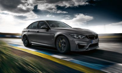 Η BMW M GmbH παρουσιάζει μία ακόμα αποκλειστική, ειδική έκδοση περιορισμένης παραγωγής, με τη μορφή της νέας BMW M3 CS (κατανάλωση μικτού κύκλου: 8,3 l/100 km*, εκπομπές CO2 στο μικτό κύκλο: 194 g/km*). Με έντονη σπορ παρουσία, η νέα M3 CS συνεχίζει την μακροχρόνια παράδοση των επιτυχημένων ειδικών εκδόσεων Μ, που ξεκίνησε το 1988 με την E30 BMW M3 Evolution. Ταυτόχρονα, το τετράθυρο sedan υψηλών επιδόσεων προσφέρει ένα τέλειο κοκτέιλ δυναμισμού και καθημερινής πρακτικότητας. Ο ισχυρός 3-λιτρος κινητήρας ξεπερνά τις επιδόσεις της M3 με Competition Package κατά 10 ίππους, φτάνοντας τα 460 hp. Η προηγμένη τεχνολογία M TwinPower Turbo προσφέρει στην M3 CS επιτάχυνση 0 - 100 km/h σε μόλις 3,9 δευτερόλεπτα. Η τελική ταχύτητα της νέας, ειδικής έκδοσης που προσφέρεται στάνταρ με το M Driver’s Package, περιορίζεται από τον ηλεκτρονικό κόφτη στα 280 km/h. Με δύο υπερσυμπιεστές mono-scroll, εναλλάκτη αέρα, High Precision Injection, μεταβλητό χρονισμό βαλβίδων VALVETRONIC και πλήρως μεταβλητό χρονισμό εκκεντροφόρων Double-VANOS, ο εξακύλινδρος εν σειρά κινητήρας στοχεύει μεν σε κορυφαίες επιδόσεις, αλλά έχει σχεδιαστεί επίσης με γνώμονα την πλούσια ροπή από χαμηλές στροφές και την εξαιρετική απόδοση (κατανάλωση μικτού κύκλου: 8,3 l/100 km*, εκπομπές CO2 στο μικτό κύκλο: 194 g/km*). Πιέζοντας το νέο, κόκκινο μπουτόν start/stop ενεργοποιείται ο κινητήρας, συνοδεία ενός συναρπαστικού ήχου από τη νέα, ειδικά ρυθμισμένη σπορ εξάτμιση της νέας BMW M3 CS – με τέσσερις απολήξεις εξαγωγής. Η νέα BMW M3 CS είναι στάνταρ εξοπλισμένη με το 7άρι κιβώτιο διπλού συμπλέκτη M Double Clutch Transmission (M DCT) με Drivelogic. Το προηγμένο κιβώτιο έχει ανεξάρτητο ψυγείο λαδιού και προσφέρει αυτόματες αλλαγές σχέσεων αλλά και μηχανικές από τα σχετικά χειριστήρια (paddles) στο τιμόνι. Οι σχέσεις αλλάζουν σε κλάσματα του δευτερολέπτου, χωρίς διακοπή στη ροή ισχύος, αλλά χρησιμοποιείται μία μακριά έβδομη σχέση για να κρατά τις στροφές χαμηλά και να ελαχιστοποιεί την κατανάλωση σε μεγάλα ταξίδια στον αυτοκινητόδρομο. Η ανάρτηση της νέας BMW M3 CS θυμίζει αυτή της M3 με Competition Package. Οι σύνδεσμοι και τα ακραξόνια τόσο στον εμπρός όσο και στον πίσω άξονα κατασκευάζονται από σφυρήλατο αλουμίνιο, γι’ αυτό και είναι πανάλαφρα. Έτσι, οι μη αναρτώμενες μάζες είναι περιορισμένες, προς όφελος της δυναμικής συμπεριφοράς. Η M3 CS εφοδιάζεται στάνταρ με ανάρτηση Adaptive M, της οποίας η γεωμετρία έχει ρυθμιστεί για βελτιστοποιημένες επιδόσεις στο δρόμο και στην πίστα. Την καλύτερη δυνατή πρόσφυση σε όλες τις οδηγικές συνθήκες εξασφαλίζουν το σύστημα DSC (Dynamic Stability Control) – που περιλαμβάνει M Dynamic Mode – και το Active M Differential. Τα συστήματα ελέγχου για την ανάρτηση Adaptive M, το DSC και το Active M Differential (ενεργό διαφορικό Μ) έχουν τροποποιηθεί σύμφωνα με τις δυναμικές απαιτήσεις της BMW M3 CS, όπως και το σετάρισμα του ηλεκτρομηχανικού συστήματος διεύθυνσης. Ο οδηγός έχει τη δυνατότητα να προσαρμόσει τις ρυθμίσεις των συστημάτων διεύθυνσης και ανάρτησης στις προσωπικές του προτιμήσεις ή απαιτήσεις της εκάστοτε διαδρομής. Οι ζάντες ελαφρού κράματος αλουμινίου (μπροστά: 9 J x 19, πίσω: 10 J x 20) συμπεριφέρονται άριστα στην αγωνιστική πίστα, και εφοδιάζονται (στάνταρ) με ελαστικά Michelin Pilot Sport Cup 2 (εμπρός: 265/35 R 19, πίσω: 285/30 R 20). Τα ημι-σλικ ελαστικά που έχουν έγκριση για χρήση στο δρόμο, προσφέρουν ασυναγώνιστη πρόσφυση και ανώτερη πλευρική ευστάθεια στις υψηλές ταχύτητες στην πίστα. Η M3 CS μπορεί επίσης να παραγγελθεί με ελαστικά δρόμου Michelin Sport. Στο εσωτερικό της νέας BMW M3 CS, η δίχρωμη, δερμάτινη επένδυση των καθισμάτων σε Silverstone/Black και Alcantara δημιουργεί ένα ακαταμάχητο περιβάλλον που ξεχειλίζει από σπορ γοητεία και αναμφισβήτητη ποιότητα. Κανείς οδηγός μιας M3 CS δεν χρειάζεται να στερηθεί απολαύσεις της ζωής, όπως ο αυτόματος έλεγχος κλιματισμού, το σύστημα ήχου Harman Kardon surround και το Σύστημα Πλοήγησης Professional, που προσφέρονται στάνταρ. Στο εξωτερικό, οι σχεδιαστές της BMW M GmbH χάρισαν στη νέα M3 CS μία εμφάνιση που υποδηλώνει τις σπορ προθέσεις της. Το στοιχείο ταυτότητας του εμπρός τμήματος μαζί με τους προηγμένους, προηγμένους δίδυμους προβολείς LED είναι η εμπρός ποδιά με μεγάλους αεραγωγούς τριών τμημάτων. Η διακριτική αεροτομή Gurney πίσω έχει σχεδιαστεί ειδικά για τη νέα M3 CS, και συνεργάζεται με το εμπρός splitter και τον πίσω διαχύτη για ελαχιστοποίηση της δυναμικής άνωσης. Τα εξαρτήματα αυτά κατασκευάζονται από ελαφρύ και εξαιρετικά άκαμπτο high-tech πλαστικό ενισχυμένο με ανθρακονήματα (CFRP), όπως το καπό και η οροφή της νέας BMW M3 CS. Οι παραγγελίες για τη νέα BMW M3 CS θα ξεκινήσουν από τον Ιανουάριο του 2018. Η κατασκευή της ειδικής έκδοσης θα περιοριστεί σε 1.200 αντίτυπα λόγω παραγόντων που έχουν σχέση με την παραγωγή, η οποία θα ξεκινήσει από το Μάρτιο του 2018.