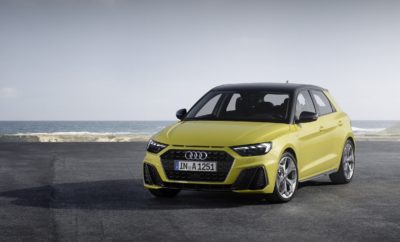 Νέο Audi A1: πολύ περισσότερο από ένα mini premium μοντέλο, 100% Audi • Ένα premium compact μοντέλο με ανατρεπτικό design και κορυφαία ποιότητα και κύλιση • Ένα μοντέλο κατασκευασμένο για το νέο, ψηφιακό κόσμο • Με τεχνολογίες ψυχαγωγίας (infotainment) από τα μεγαλύτερης κατηγορίας Audi • Με καινοτόμα συστήματα υποβοήθησης οδηγού για μεγαλύτερη άνεση και ασφάλεια • Λανσάρισμα το πρώτο τρίμηνο του 2019 To πρώτο Α1 που παρουσιάστηκε το 2010, προκάλεσε αίσθηση και γνώρισε μεγάλη επιτυχία. Λανσαρίστηκε ως «το πρώτο σου Audi» και για πολύ κόσμο αποτέλεσε την είσοδο στον ξεχωριστό κόσμο της Audi. Στη δεύτερη γενιά του, που θα λανσαριστεί το 2019, το ολοκαίνουργιο Α1 έρχεται να δώσει νέα ταυτότητα στην κατηγορία των premium compact μοντέλων. Με ενθουσιώδες, ανατρεπτικό design, κορυφαία ποιότητα υλικών και κύλιση ανώτερης κατηγορίας, το νέο premium compact εκτοξεύει τον πήχυ και επαναπροσδιορίζει το segment. Με εξελιγμένα συστήματα υποβοήθησης οδηγού και hi-tech Infotainment, παραμένοντας μόνιμα συνδεδεμένο με τον ψηφιακό κόσμο, το νέο Α1 θα προσφέρει διευρυμένες δυνατότητες εξατομίκευσης και προσωποποίησης. Ένα μοντέλο που αποτελεί ένα άλμα στο μέλλον της αυτοκίνησης την ίδια στιγμή που το DNA του είναι αντιπροσωπευτικό, 100% Audi! Το A1 είναι λίγο πιο μακρύ από τον προκάτοχό του (+56 χιλ., στα 4,03 μ.) ενώ διατηρεί ίδιο το πλάτος (1,74 μ.), με ύψος μόλις 1,43 μ. Το compact σπορ αμάξωμα με τη νέα, Singleframe μάσκα χαρακτηρίζεται από φαρδιά μετατρόχια και κοντούς πρόβολους, ενώ κάτω από το άκρο του καπό υπάρχουν τρεις επίπεδες σχισμές, «φόρος τιμής» στο θρυλικό Sport quattro που κυριάρχησε στα ράλλυ το 1984. Από το πλάι, το νέο A1 έχει έντονες σχεδιαστικές επιρροές τόσο από το Audi Ur-quattro όσο και από το Sport quattro. Ο σχεδιασμός της οροφής, που μπορεί να είναι βαμμένη σε διαφορετικό χρώμα από τις εμπρός κολόνες μέχρι την πίσω αεροτομή, δημιουργεί την εντύπωση ότι είναι πιο επίπεδη από ότι στην πραγματικότητα και το συνολικό design έχει σφηνοειδές σχήμα (συντελεστής οπισθέλκουσας 0,31). Τα φώτα ημέρας με τους προαιρετικούς φουλ LED προβολείς συνδυάζονται με ένα δυναμικό 3D μοτίβο στα πίσω φωτιστικά σώματα, ώστε το Α1 να είναι ιδιαίτερα αναγνωρίσιμο, ακόμα και στο σκοτάδι. Στο εσωτερικό, ο οδηγός απολαμβάνει ένα μοναδικής σπορ αίσθησης περιβάλλον! Ο πλήρως ψηφιακός πίνακας οργάνων, τα χειριστήρια και η προαιρετική οθόνη αφής MMI είναι έντονα προσανατολισμένα προς τον οδηγό, δίνοντας έμφαση στο στοιχείο της απολαυστικής οδήγησης και της εξατομίκευσης. Σε επίπεδο εξοπλισμού, υπάρχει πολύ μεγάλος βαθμός ευελιξίας και δυνατότητα συνδυασμού εκδόσεων. Το νέο A1 είναι πολύ πιο ευρύχωρο για τον οδηγό, τον συνοδηγό και τους πίσω επιβάτες. Παρά τις συμπαγείς εξωτερικές διαστάσεις και την σπορ γραμμή της οροφής, οι ενήλικες στα πίσω καθίσματα εξακολουθούν να απολαμβάνουν πολύ χώρο για τα κεφάλια και τα πόδια τους. Το νέο A1 είναι κατασκευασμένο για τη νέα, ψηφιακή εποχή. Ακόμη και η εισαγωγική έκδοση διαθέτει στάνταρ τον πλήρως ψηφιακό πίνακα οργάνων υψηλής ανάλυσης με διαγώνιο 10,25 ίντσες και με πολύ-λειτουργικό τιμόνι. Το προαιρετικό Audi virtual cockpit με το ευρύτερο φάσμα λειτουργιών, παρέχει πολλές και ολοκληρωμένες πληροφορίες όπως κινούμενους χάρτες πλοήγησης και γραφικά για μερικά συστήματα υποβοήθησης, στο άμεσο οπτικό πεδίου του οδηγού. Το Infotainment στο νέο A1 προέρχεται από τις μεγαλύτερες κατηγορίες. Το ηχοσύστημα MMI είναι στάνταρ και μπορεί να ρυθμιστεί από τους διακόπτες πολλαπλών λειτουργιών στο τιμόνι και την οθόνη στον πλήρως ψηφιακό πίνακα οργάνων. Στην κορυφαία διαμόρφωση, η πλοήγηση MMI plus συνδυάζεται με οθόνη αφής MMI 10,1 ιντσών, η οποία ταιριάζει άψογα με τη μαύρη γυαλιστερή επιφάνεια. Το νέο A1 εγγυάται κορυφαία συνδεσιμότητα για οδηγό και επιβάτες, προσφέροντας συνδέσεις Apple CarPlay και Android Auto στο ΜΜΙ που έχει προγραμματιστεί ειδικά για αυτά. Οι φανατικοί της μουσικής και της υψηλής πιστότητας του ήχου θα ικανοποιηθούν ιδιαίτερα με τα διαθέσιμα ηχοσυστήματα, με κορυφαίο αυτό της Bang & Olufsen, με 11 ηχεία και συνολική απόδοση 560 Watt, ενώ η 3D λειτουργία του χρησιμοποιεί το παρμπρίζ σαν επιφάνεια αντανάκλασης. Τα συστήματα υποβοήθησης του οδηγού του Audi A1 έρχονται επίσης από τις μεγαλύτερες κατηγορίες. Διατηρούν το compact μοντέλο στη σωστή απόσταση από το προπορευόμενο αυτοκίνητο, προστατεύουν τον οδηγό από πιθανούς κινδύνους και τον διευκολύνουν να παραμένει στη λωρίδα του ή να παρκάρει. Το νέο Α1 θα είναι διαθέσιμο με δυνατούς και οικονομικούς κινητήρες βενζίνης TFSI, με ιπποδυνάμεις που κυμαίνονται από 95 HP (70 kW) έως 200 HP (147 kW). Η υπερτροφοδότηση (turbo), ο άμεσος ψεκασμός και το φίλτρο κατακράτησης σωματιδίων είναι στάνταρ. Το κιβώτιο ταχυτήτων είναι είτε μηχανικό είτε το αυτόματο διπλού συμπλέκτη S tronic, των 7 ή 6 σχέσεων.