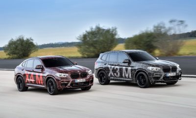 Η BMW M GmbH επεκτείνει τη γκάμα μοντέλων υψηλών επιδόσεων στις κατηγορίες Sports Activity Vehicles (SAV) και Sports Activity Coupes (SAC). Ο κλασικός, σπορ χαρακτήρας των μοντέλων BMW θα ‘περάσει’ σε δύο ακόμα εκδόσεις της οικογένειας BMW X, η παραγωγή των οποίων έχει ήδη ξεκινήσει. Κατά τη διάρκεια των αγώνων DTM στο Nürburgring, το Σαββατοκύριακο 7 – 9 Σεπτεμβρίου 2018, πρωτότυπες BMW X3 M και BMW X4 M θα δοκιμαστούν στην πίστα. Αυτό σημαίνει ότι τα καμουφλαρισμένα οχήματα προ-παραγωγής θα κάνουν την πρώτη τους δημόσια εμφάνιση ακριβώς εκεί όπου οι δυναμικές αρετές των BMW X3 M και BMW X4 M θα αγγίξουν το ανώτατο επίπεδο ωριμότητάς τους. Στο Nürburgring, κατά παράδοση, ολοκληρώνεται το τελικό στάδιο δοκιμών και το πρόγραμμα σεταρίσματος για το συνολικό πακέτο M, που περιλαμβάνει σύστημα κίνησης, ανάρτηση και αεροδυναμική. Με μεγάλους αεραγωγούς μπροστά, ειδικά αεροδυναμικά βοηθήματα M και σύστημα εξαγωγής με τέσσερις απολήξεις ενσωματωμένες στην πίσω ποδιά, τα οχήματα ήδη φέρουν τα χαρακτηριστικά ενός μοντέλου BMW M σε αρχικό στάδιο της διαδικασίας εξέλιξής τους. Από τεχνολογικής απόψεως, το στοιχείο που ξεχωρίζει στις BMW X3 M και BMW X4 M είναι ένας νέος, straight six κινητήρας με τεχνολογία M TwinPower Turbo και ιδιαίτερη ευστροφία. Μέρος της διαδικασίας εξέλιξης είναι το τελικό ‘tuning’ της τεχνολογίας M xDrive που λανσαρίστηκε για πρώτη φορά στη νέα BMW M5. Η τεχνολογία αυτή χρησιμοποιείται στις BMW X3 M και BMW X4 M για να εξασφαλίζει εξαιρετική και χωρίς διακοπές μεταφορά ισχύος σε όλους τους τροχούς, με στόχο τις υψηλές επιδόσεις. Η εξέλιξη του συστήματος τετρακίνησης για τις απαιτήσεις των μοντέλων M εγγυάται μέγιστη ελκτική πρόσφυση και κατανομή ροπής χωρίς απώλειες, για την επίτευξη μιας άκρως δυναμικής συμπεριφοράς. Με τη συμβολή του ενεργού πίσω διαφορικού Μ, το δυναμικό στρίψιμο, η ευελιξία και η ακριβής συμπεριφορά των BMW X3 M και BMW X4 M ανεβαίνουν σε επίπεδο που δεν μπορεί να συγκριθεί με τον ανταγωνισμό. «Με ειδικά χαρακτηριστικά επιδόσεων M, οι BMW X3 M και BMW X4 M θα εγκαινιάσουν νέα πρότυπα δυναμικής συμπεριφοράς στις αντίστοιχες κατηγορίες οχημάτων», δήλωσε ο Frank van Meel, Πρόεδρος της BMW M GmbH. Με τις τελευταίες προϊοντικές καινοτομίες της, η BMW M GmbH για μία φορά ακόμα εισέρχεται σε μία νέα κατηγορία. Οι BMW X3 M και BMW X4 M θα προσφέρουν για πρώτη φορά την εμπειρία των κορυφαίων επιδόσεων, της ευελιξίας και της αίσθησης οδηγικής ακρίβειας σε μοντέλα Sports Activity Vehicle και Sports Activity Coupe της premium μεσαίας κατηγορίας. Επομένως, η BMW M GmbH συνεχίζει σταθερά την επιτυχημένη στρατηγική δυναμικής επέκτασης, με νέες και άκρως ελκυστικές αυτοκινητιστικές φιλοσοφίες.