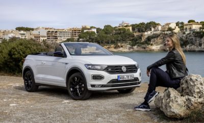 • Η Volkswagen συνεχίζει την SUV επίθεση. Με την κυκλοφορία του T-Roc Cabriolet, η Volkswagen επεκτείνει την κυρίαρχη παρουσία της στην compact SUV κατηγορία • Design με έντονο συναίσθημα. Με τις ρέουσες, κοφτές σχεδιαστικές γραμμές, το εξωτερικό του αυτοκινήτου επικοινωνεί τον ισχυρό του χαρακτήρα • Χώροι για τέσσερα άτομα. Το T-Roc Cabriolet προσφέρει άνετους χώρους για 2 + 2 άτομα. Οι θέσεις είναι υπερυψωμένες, παρέχοντας πολύ καλή θέα • Ελαφρύ και γρήγορο. Η μαλακή οροφή διαθέτει ηλεκτροϋδραυλικό μηχανισμό. Ανοίγει και κλείνει αυτόματα, σε εννέα και έντεκα δευτερόλεπτα αντίστοιχα, ακόμα και κατά την κίνηση με ταχύτητες μέχρι 30 χλμ./ώρα • Υψηλό επίπεδο ασφάλειας. Σε περίπτωση επικείμενης ανατροπής, ένα ειδικό σύστημα προστασίας εκτείνεται αυτόματα πίσω από τα πίσω καθίσματα προστατεύοντας τους επιβάτες • Ψηφιακό concept λειτουργίας. Το Digital Cockpit και το σύστημα Infotainment Discover Media διαθέσιμα στον προαιρετικό εξοπλισμό • Πάντα συνδεδεμένο. Το Infotainment και η υπηρεσία Volkswagen We συνδέουν το αυτοκίνητο με το περιβάλλον του, καθιστώντας την πλοήγηση και την ψυχαγωγία ακόμη καλύτερη • Δύο εκδόσεις εξοπλισμού. Η Style απευθύνεται στους fans του design, ενώ η R-Line έχει σχεδιαστεί ειδικά για όσους έχουν πιο σπορ απαιτήσεις • Πλούσιος βασικός εξοπλισμός. Ανάμεσα σε άλλα το Front Assist και το Lane Assist ανήκουν στο βασικό εξοπλισμό του T-Roc Cabriolet, όπως και οι τροχοί αλουμινίου 17 ιντσών • Δύο κινητήρες TSI. Ο 1.0 TSI έχει απόδοση 115 PS, ενώ ο 1.5 TSI αποδίδει 150 PS. Και στις δύο περιπτώσεις η κίνηση μεταδίδεται στους εμπρός τροχούς. Διαθέσιμο και αυτόματο κιβώτιο DSG Ελευθερία χωρίς οροφή - Το νέο T-Roc Cabriolet υπόσχεται απεριόριστη ελευθερία χωρίς όρια, για πρώτη φορά στην compact SUV κατηγορία. Ως το πρώτο cabrio SUV σε αυτήν την κατηγορία, συνδυάζει το χαρακτήρα και τη δυναμική ενός SUV με την απολαυστική οδηγική εμπειρία ενός ανοιχτού αυτοκινήτου. Το μοντέλο θα κυκλοφορήσει σύντομα στην αγορά της Γερμανίας και την υπόλοιπη Ευρώπη. Εξωστρεφής και συναισθηματικός σχεδιασμός. Το T-Roc Cabriolet αποκαλύπτει αμέσως αυτό που αντιπροσωπεύει – οδηγική διασκέδαση, ελευθερία και κέφι για οδήγηση. Το φαρδύ εμπρόσθιο άκρο, οι προεξέχουσες γραμμές και οι συμπαγείς διαστάσεις δίνουν στο μοντέλο ένα ξεχωριστό μείγμα cool και δυναμικής εμφάνισης SUV. Βελτιωμένη οδηγική εμπειρία με καλή θέα. Το 2 + 2 θέσεων T-Roc Cabriolet βασίζεται στην MQB πλατφόρμα. Έχει μήκος 4,268 μ., μεταξόνιο 2,63 μ., πλάτος 1,811 μ. (χωρίς εξωτερικούς καθρέφτες) και ύψος 1,522 m. Το ύψος πάνω από το δρόμο σε σχέση με το σημείο H είναι 59,9 εκ. για τον οδηγό και τον συνοδηγό και ακόμη και 61,6 εκ. για τους επιβάτες πίσω. Το κέντρο βάρους του αυτοκινήτου - χαμηλό για ένα SUV - ενισχύει την οδηγική απόλαυση ενώ ο χώρος αποσκευών έχει χωρητικότητα 280 λίτρων. Άλλα χαρακτηριστικά γνωρίσματα είναι οι βραχείες προεξοχές και τα μεγάλα πλάτη τροχιών 1.538 mm (εμπρός) και 1.539 mm (πίσω). Οι πτυσσόμενες πλάτες των πίσω καθισμάτων και ο προαιρετικός κοτσαδόρος υπογραμμίζουν την ευελιξία του αυτοκινήτου. Μαλακή οροφή. Ακολουθώντας τα βήματα του Beetle και του Golf Cabriolet, το T-Roc Cabriolet έχει μια κλασική ελαφριά μαλακή κορυφή που αποτελείται από τρία στρώματα. Ανοίγει και κλείνει πλήρως αυτόματα με ηλεκτροϋδραυλικό μηχανισμό σε εννέα και έντεκα δευτερόλεπτα αντίστοιχα - και αυτό είναι επίσης δυνατό κατά τη διάρκεια της πορείας σε ταχύτητες μέχρι 30 χλμ./ώρα. Όταν είναι ανοιχτό, το μαλακό επάνω μέρος διπλώνεται σε σχήμα Ζ πίσω από τα πίσω καθίσματα, ενώ η συμπαγής μετωπική οριζόντια δοκός χρησιμεύει ως κάλυμμα. Όταν η οροφή είναι κλειστή, οι ράβδοι συγκράτησης την εμποδίζουν να «μπαλονιάζει» σε υψηλές ταχύτητες. Υπάρχει πάντα μια ευχάριστη αίσθηση ηρεμίας μέσα στο αυτοκίνητο, εξαιτίας της αποτελεσματικής ηχομόνωσης στις πόρτες και τα παράθυρα. Στον προαιρετικό εξοπλισμό διατίθεται και ειδικά μελετημένο αλεξινέμιο. Ασφάλεια σε κάθε λεπτομέρεια. Αν το αυτοκίνητο κινδυνεύει να ανατραπεί, ενεργοποιείται ένα ειδικό σύστημα προστασίας: μέσα σε κλάσματα του δευτερολέπτου, δύο χοντρά πλαίσια εκτείνονται πίσω από τα πίσω προσκέφαλα. Εν τω μεταξύ, οι ειδικές ενισχύσεις στο σώμα του T-Roc Cabriolet αντισταθμίζουν την έλλειψη σταθερής οροφής. Ψηφιακό concept λειτουργίας. Το T-Roc Cabriolet διατίθεται προαιρετικά με δύο στοιχεία ψηφιακής απεικόνισης και ελέγχου: το ψηφιακό cockpit στο οπτικό πεδίο του οδηγού και το σύστημα ψυχαγωγίας και ενημέρωσης (Infotainment) Discover Media. Το τελευταίο είναι μία από τις τελευταίες γενιές συστημάτων ψυχαγωγίας και διαθέτει μια online μονάδα σύνδεσης με ολοκληρωμένη eSIM. Συνδέοντας το αυτοκίνητο με το περιβάλλον και τα smartphones των χρηστών, γίνονται διαθέσιμες νέες λειτουργίες και υπηρεσίες από τη σειρά We Connect και We Connect Plus. Για ακόμα μεγαλύτερη ηχητική απόλαυση είναι διαθέσιμο και το ηχοσύστημα 12 καναλιών της "beats". Εκδόσεις εξοπλισμού Style και R-Line. Το T-Roc Cabriolet είναι διαθέσιμο σε δύο εκδόσεις εξοπλισμού. Η Style είναι προσανατολισμένη στο design, ενώ η R-Line (διαθέσιμη μόνο με τον 1.5 TSI κινητήρα) έχει πιο σπορ προσανατολισμό, με σπορ ρυθμίσεις, προοδευτικό σύστημα διεύθυνσης και δυνατότητα επιλογής προγραμμάτων οδήγησης ως στάνταρ. Οι προφυλακτήρες είναι μοναδικοί για το μοντέλο R-Line και τα σπορ καθίσματα είναι καλυμμένα με ύφασμα και δερματίνη. Ο βασικός εξοπλισμός υποβοήθησης οδηγού και ασφάλειας και για τις δύο εκδόσεις περιλαμβάνει Front Assist με City Braking System και ανίχνευση πεζών, το σύστημα αυτόματης πέδησης μετά τη σύγκρουση και τη λειτουργία Lane Assist. Τόσο η Style όσο και η R-Line διαθέτουν ζάντες αλουμινίου 17 ιντσών, αλλά προαιρετικά διατίθενται τροχοί με διάμετρο 18 ή 19 ίντσες. Αποδοτικοί TSI κινητήρες. Σε οποιαδήποτε επιφάνεια, στην πόλη, σε σαθρό έδαφος, σε επαρχιακούς δρόμους ή αυτοκινητόδρομους, το T-Roc Cabriolet ανταπεξέρχεται επιδεικνύοντας υπεροχή. Υπάρχει μια επιλογή από δύο ισχυρούς και οικονομικούς βενζινοκινητήρες με υπερσυμπιεστή και άμεσο ψεκασμό, με την ισχύ να μεταδίδεται στους εμπρός τροχούς. Ο 1.0 TSI είναι ο γνωστός τρικύλινδρος κινητήρας με ισχύ 115 PS και ροπή 200 Nm, ενώ ο τετρακύλινδρος 1.5 TSI αποδίδει ισχύ 150 PS και 250 Nm. Ένα μηχανικό κιβώτιο ταχυτήτων 6-σχέσεων είναι στάνταρ ενώ ο μεγαλύτερος TSI μπορεί να συνδυαστεί με το αυτόματο κιβώτιο ταχυτήτων DSG 7-σχέσεων. Ο κινητήρας 1.0 TSI. Η βασική έκδοση του TSI είναι ένας συμπαγής τρικύλινδρος κινητήρας που ζυγίζει μόλις 88 κιλά. Ο στροφαλοφόρος είναι τόσο λεπτός και σωστά ισορροπημένος ώστε να μην απαιτείται άξονας ισορροπίας. Ο μικρός TSI παράγει μέγιστη ισχύ 115 PS / 85 kW και μέγιστη ροπή 200 Nm από 999 κ. εκ., από 2.000 έως 3.500 σ.α.λ. Επιταχύνει το T-Roc Cabriolet από το μηδέν στα 100 χλμ./ώρα σε 11,7 δευτερόλεπτα, με μέγιστη ταχύτητα 187 χλμ./ώρα. Η κατανάλωση καυσίμου περιορίζεται στα 5,6 έως 5,4 λ./100χλμ. (σε NEDC), που αντιστοιχεί σε επίπεδο εκπομπών CO2 129 έως 123 γρμ./χλμ.. Ο κινητήρας 1.5 TSI. Ο τετρακύλινδρος κινητήρας αποδίδει την ισχύ των 150 PS / 110 kW από 1.498 κυβικά εκατοστά, παρέχοντας ροπή 250 Nm από 1.500 σε 3.500 σ.α.λ. Αυτό επιτρέπει την επιτάχυνση 0-100 χλμ./ώρα σε 9,6 δευτερόλεπτα, φτάνοντας μέχρι την τελική ταχύτητα των 205 χλμ./ώρα. Στον κύκλο NEDC, το T-Roc Cabriolet 1.5 TSI με χειροκίνητο κιβώτιο ταχυτήτων καταναλώνει κατά μέσο όρο 5,7 έως 5,5 λίτρα καυσίμου ανά 100 km (130 έως 125 γραμμάρια CO2 ανά χιλιόμετρο). Ένας παράγοντας που επιτρέπει ένα τέτοιο υψηλό επίπεδο απόδοσης είναι το σύστημα ACT, το οποίο διακόπτει προσωρινά τους δύο κυλίνδρους σε περίπτωση σταθερού τρόπου οδήγησης. Πλαίσιο και ανάρτηση. Η Volkswagen έδωσε στο T-Roc Cabriolet την ίδια σχεδίαση σε πλαίσιο και ανάρτηση με αυτά των μεγαλύτερων μοντέλων. McPherson στους εμπρόσθιους τροχούς, ενώ μια ανάρτηση πέντε συνδέσμων λειτουργεί στον οπίσθιο άξονα, ικανή να χειρίζεται ξεχωριστά τις διαμήκεις και τις εγκάρσιες δυνάμεις. Τα ελατήρια και οι αποσβεστήρες - τοποθετημένα ξεχωριστά στον πίσω άξονα - είναι αρμονικά ισορροπημένα, εξασφαλίζοντας άριστη άνεση με ακριβή χειρισμό, με απόσταση από το έδαφος 156 χιλιοστά (έκδοση Style), επιτρέποντας την είσοδο σε ανώμαλο έδαφος. Η επίθεση SUV βρίσκεται σε εξέλιξη. Τα μοντέλα SUV της Volkswagen έχουν θέσει το σημείο αναφοράς στην SUV κατηγορία εδώ και πολλά χρόνια. Η οικογένεια μοντέλων διαθέτει τα T-Cross, T-Roc, Tiguan και Touareg, προσφέροντας μία πλήρη γκάμα. Το T-Roc Cabriolet εισέρχεται στο ταχύτερα αναπτυσσόμενο τμήμα σε ολόκληρο τον κλάδο της αυτοκινητοβιομηχανίας – την compact κατηγορία SUV. Παράδοση στα cabrio. Ήταν ήδη από το 1949 που ο Karmann άρχισε να παράγει το Beetle Cabriolet στο Osnabrück, συμπληρωμένο από το Karmann Ghia Cabriolet από το 1957 έως το 1974. Περισσότερες από 330.000 μονάδες του ανοικτού Beetle κατέληξαν σε ευτυχείς κατόχους, με την παραγωγή να συνεχίζεται μέχρι το 1980 - η Volkswagen είχε ήδη παρουσιάσει το Golf I Cabriolet το προηγούμενο έτος. Το τελευταίο παρέμεινε στην παραγωγή μέχρι το 1993 και ακολούθησε το Golf III Cabriolet (1993-1998), το Golf IV Cabriolet (1998-2002) και το Golf VI Cabriolet (2011 - 2016). Συνολικά περισσότερα από 770.000 Golf Cabriolet παρήχθησαν κατά τη διάρκεια τεσσάρων γενεών. Όλα τα Golf Cabriolets κατασκευάστηκαν στο Osnabrück, ενώ το Eos με την πτυσσόμενη οροφή χάλυβα παρήχθη στην Palmela (Πορτογαλία) από το 2006 έως το 2015. Από το 2003 έως το 2010 κατασκευάστηκε το νέο Beetle Cabriolet στο εργοστάσιο του Μεξικού στην Puebla, ακολουθούμενο από το Beetle Cabriolet από το 2011 έως το 2019.